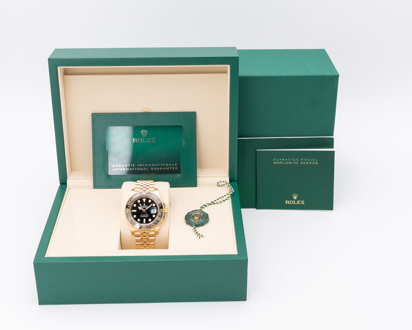 Rolex GMT Master II 40mm 126718GRNR Yellow Gold Black Dial Jubilee