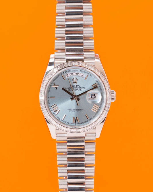2026 UNWORN Rolex Day Date 36mm 128396TBR Platinum Ice Blue Diamond Bezel Roman Dial
