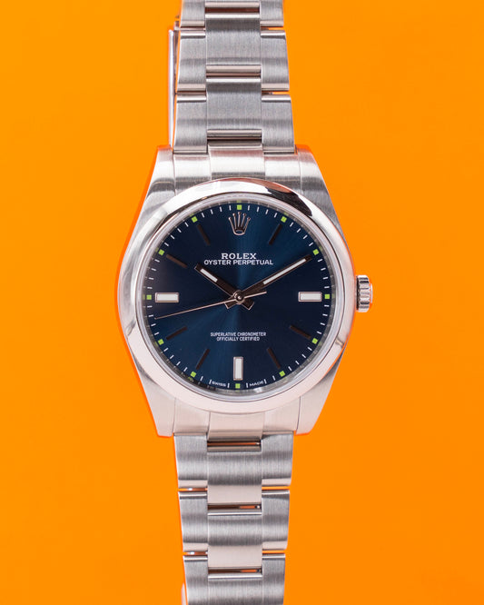 Rolex Oyster Perpetual 114300 39mm Blue With Green Markers 2017