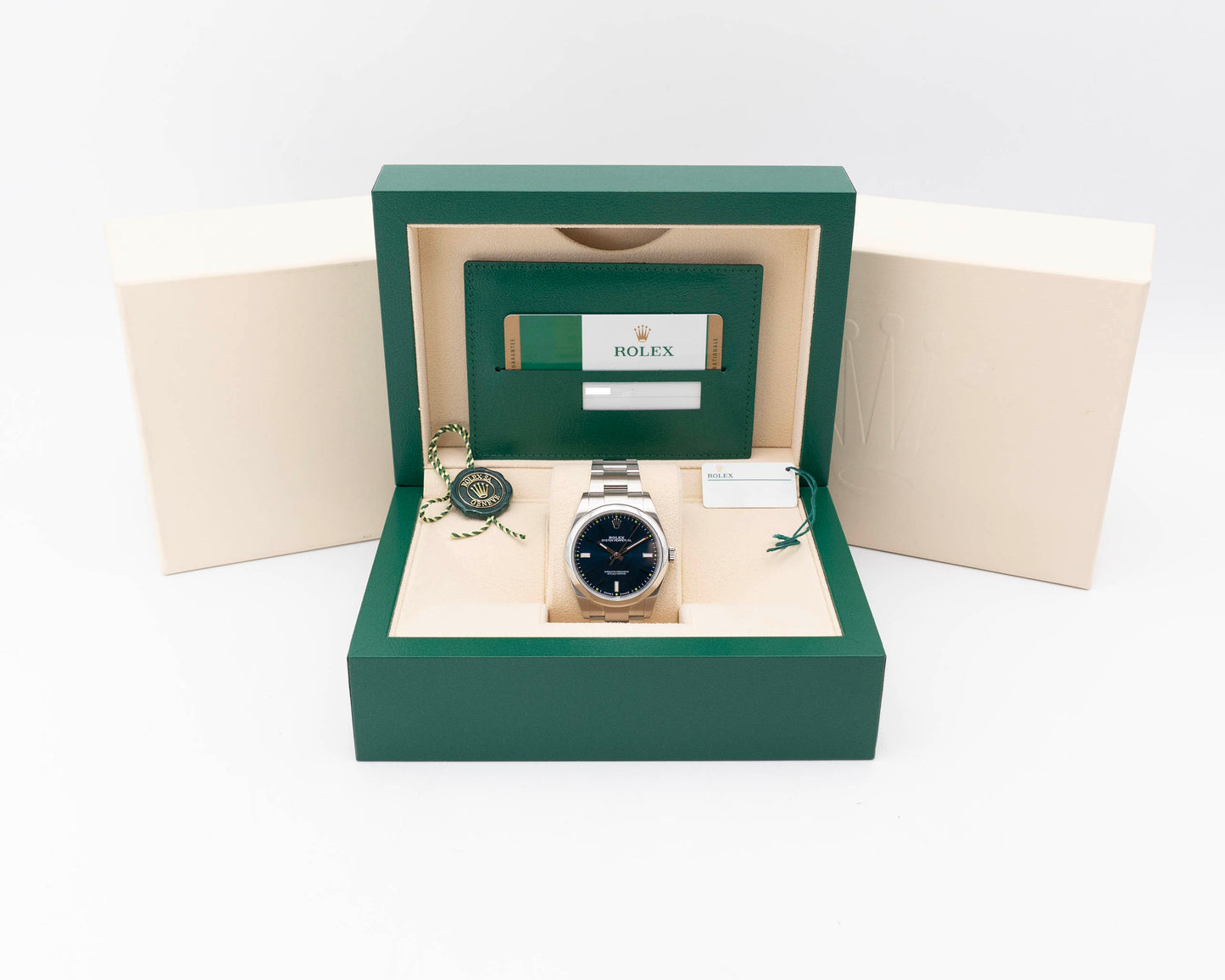 Rolex Oyster Perpetual 114300 39mm Blue With Green Markers 2017