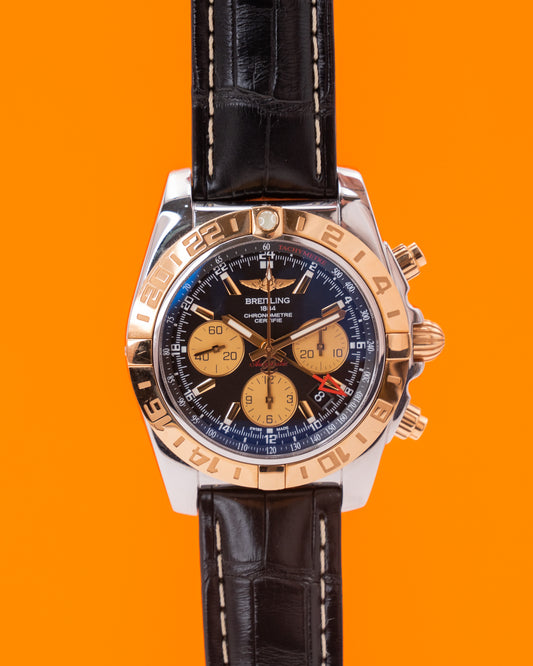 Breitling Chronomat 44mm GMT CB0420 Black Two Tone Yellow