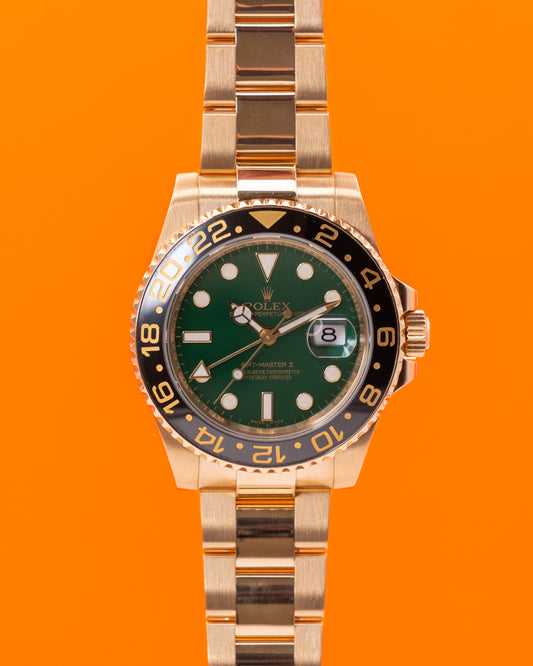 Rolex GMT Master II 40mm 116718LN Green Dial Yellow Gold