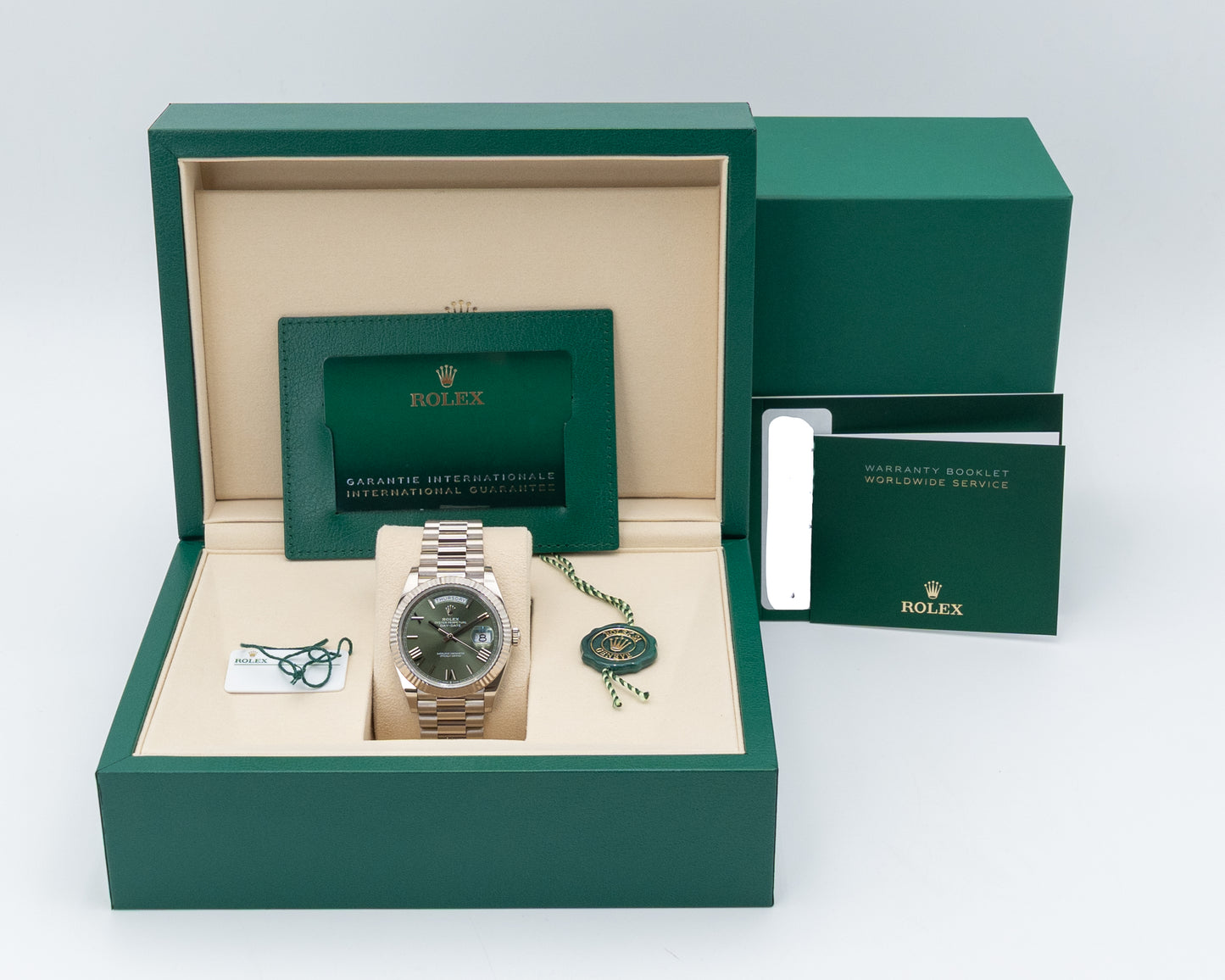 Rolex Day Date 40mm 228239 White Gold Green Roman Dial 2025