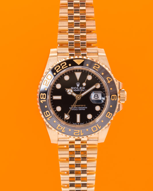 Rolex GMT Master II 40mm 126718GRNR Yellow Gold Black Dial Jubilee