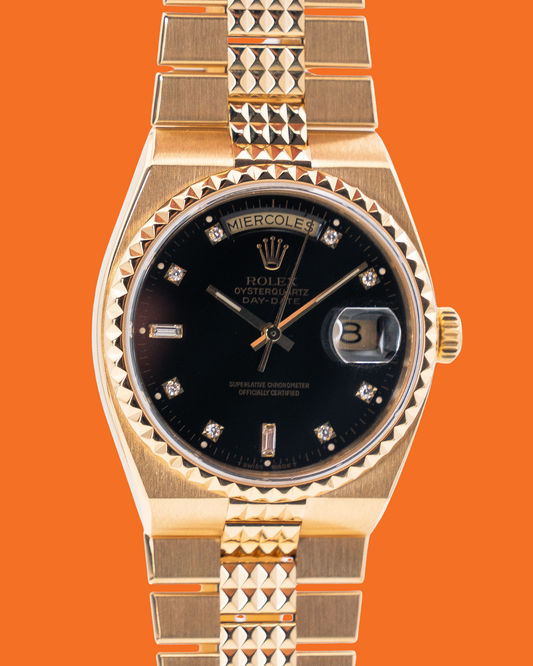 Rolex DayDate Oysterquartz pyramid 36mm 19028 Yellow Gold Black Diamond Dial Bracelet